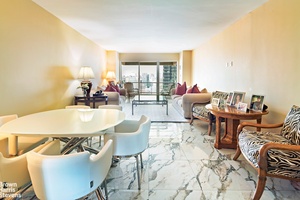 Enter this magnificent, light filled home through a marble gallery with a north facing living room and balcony and a south facing formal dining room with views of the city ...