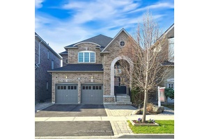 Welcome to 186 Ascalon Drive, an elegant and meticulously maintained home designed for discerning families.