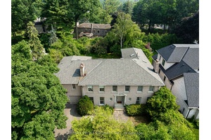 Rare opportunity to acquire ownership of a most significant lot and bespoke residence, on what is arguably the most prestigious court in Lincoln Woods.