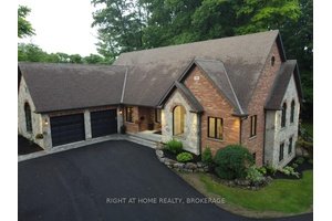 A rare find in Ancaster, this exceptional home sits on nearly one acre of private, wooded land, offering a serene and secluded setting while remaining just minutes from premier amenities ...