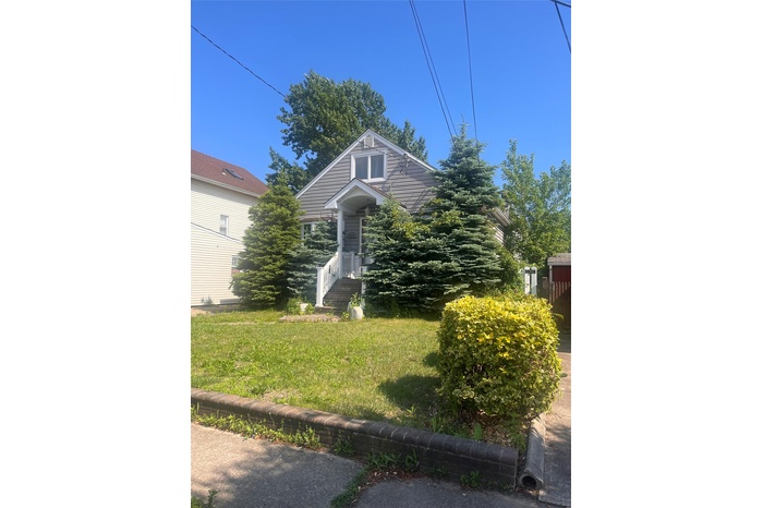 View of front of home with a front lawn