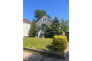 Charming Split Level located in Baldwin Harbor featuring three bedrooms and one and a half baths.