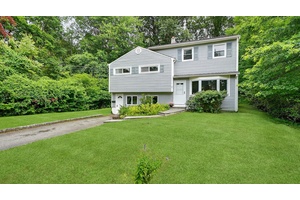 Welcome to this spacious and updated split level gem, perfectly positioned on a quiet cul de sac.