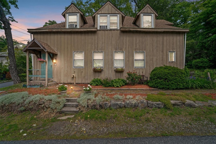 Tuxedo Park's converted carriage houses are highly desirable for their open floorplans classic charm.  Welcome to 75 Clubhouse Road.