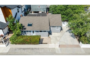 Welcome to this oversized ranch perfectly situated on a rare double lot in the highly sought after West End of Long Beach.