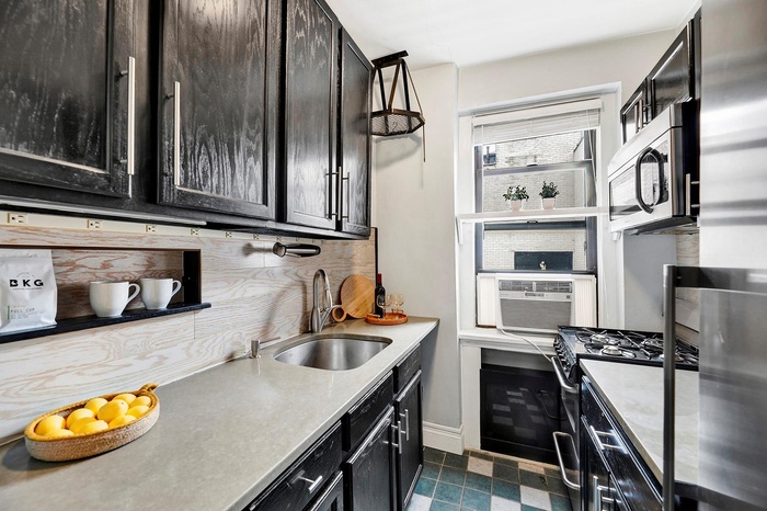 Kitchen featuring appliances with stainless steel finishes