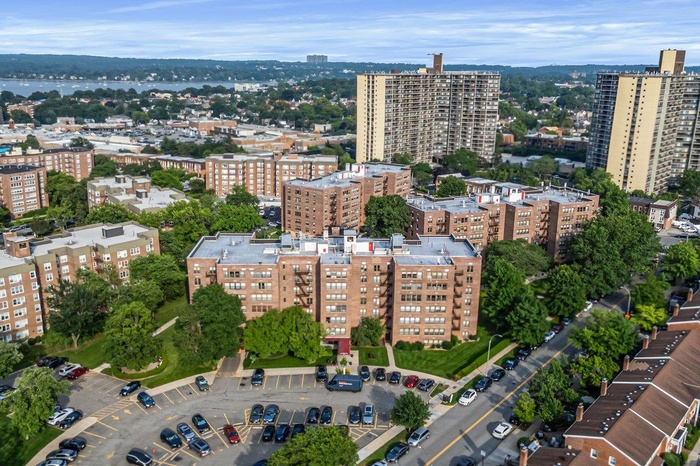 View of property location with nearby urban area