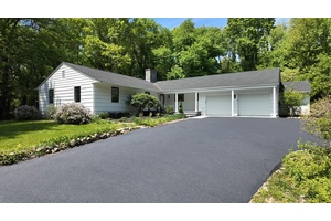 This immaculately renovated Ranch is set on 2.