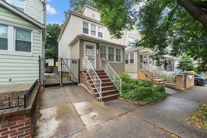 Welcome to 26 33 94th Street, a fully detached single family home in East Elmhurst featuring three bedrooms, one and a half baths, a private driveway, and a fully enclosed ...