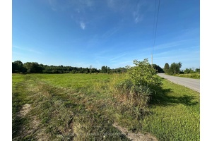 1 Acre building lot to be severed.