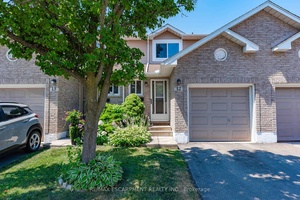 This wonderful Townhome is located in a small quiet community with mature trees, amp ; the complex is very well maintained.