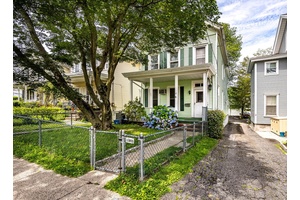 A rare opportunity to own this well built 1880's Duplex home with covered front porch amp ; perimeter fence !