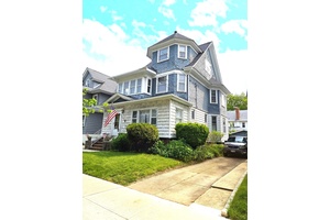 Welcome to this distinguished Victorian style single family home, perfectly situated on a 40X100 lot in the heart of Woodhaven along a charming tree lined block.