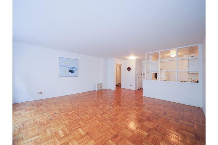 View of unfurnished living room/studio space