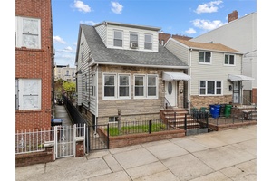 This single family home has incredible potential with R5 zoning.
