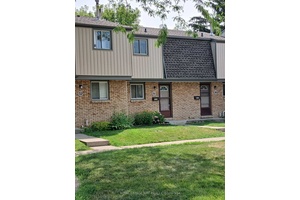 WELL CARED FOR 2 BED, 2 STOREY CONDO TOWNHOME IN GREAT AREA OF NORTH END ST.