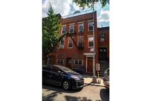 Welcome to a truly one of a kind three family townhouse in the heart of coveted Boerum Hill.