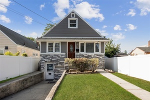 Welcome to this beautifully updated Cape in the heart of Franklin Square.