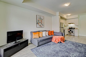 Welcome to this stunning, two year old stacked townhome built by Mattamy Homes, ideally located with beautiful park views and unmatched convenience.