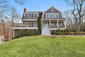 Welcome to 22 Old Trail Road, a charming beach cottage style residence tucked away in the tranquil town of Water Mill, NY.