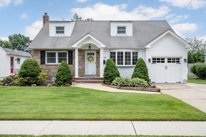 This extended Cape Cod home features a total of 5 Nice size bedrooms.