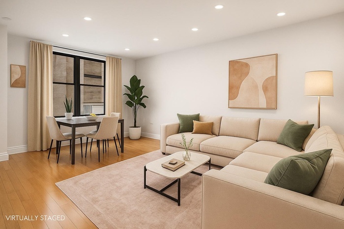 Living area featuring recessed lighting and light wood-style floors