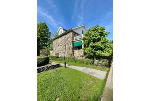 Timeless Elegance for Exceptional Living in this Expansive Home crafted by Italian Stone Masons in 1910, previously known as the Porter House Inn in the Heart of Millbrook Village.