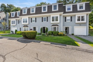 Discover the inviting charm of 58 Winterberry Circle, a desirable 1941 sq ft townhouse nestled within The Meadows.