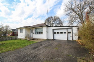 Bungalow with attached garage.