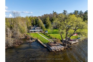 Discover this breathtaking turn key home nestled along the shores of Rice Lake, perfect for enjoying the cottage lifestyle throughout the year.