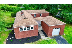 Welcome home to this charming L shaped brick ranch in desirable New Windsor !