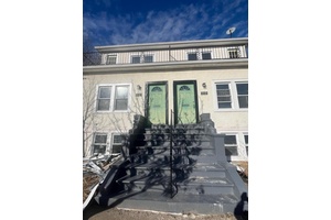 This expansive two family home offers a wealth of opportunity for both homeowners and investors alike.