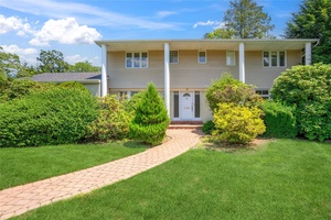 5 Bedroom, 2. 5 bath Colonial perfectly positioned mid block on a flat, 1 3 acre beautifully maintained property in the Roslyn School District.