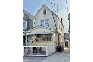 Motivated seller. Legal two family house in the heart of South Richmond hill right next to places of worship, transportation, shopping and minutes away from major airports.