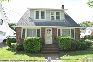 Spacious home with oversized property, well maintained, single owner occupant for over 60 years, close walk to stores, schools, and train station.