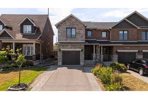 End Unit Freehold Townhouse In Desirable South East Barrie with Private Driveway.