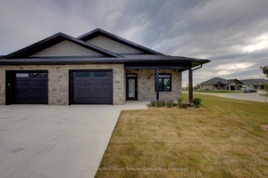 TO BE BUILT Welcome to easy, carefree living in this beautifully designed 2 bedroom, 2 bathroom end unit bungalow condo, nestled in the quiet and welcoming town of Ripley.