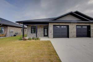 Welcome to easy, carefree living in this beautifully designed 2 bedroom, 2 bathroom end unit bungalow condo, nestled in the quiet and welcoming town of Ripley.