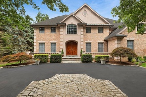 Set down a long, elegant driveway in the prestigious Old Brookville estate area, 184 High Farms Road invites you into a world where timeless architecture meets modern luxury.