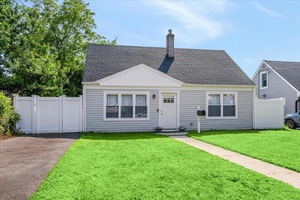 Stylishly renovated 3 bedroom cape located in the heart of Babylon Village.
