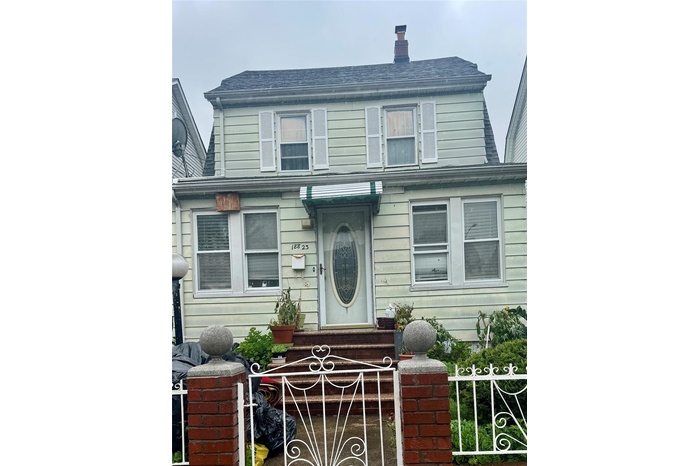 View of front facade with a chimney