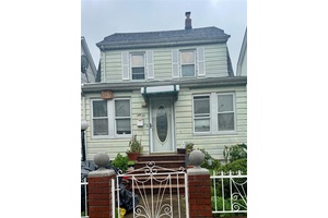 Spacious Colonial, spacious bedrooms, 3 Full Bathrooms, front enclosed porch.
