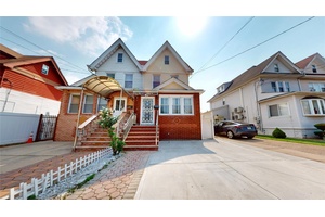 Welcome to this well maintained semi attached home in the heart of Old Mill Basin.