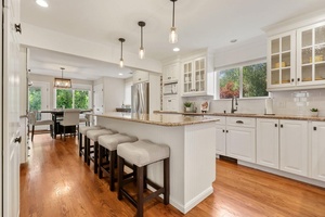 Completely Updated Sprawling Ranch offering 3, 600 Sq Ft of Refined Living Space, ideal for extended family living !
