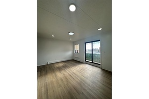 Say goodbye to circling the block this fully renovated 2 bedroom, 2 bath condo comes with its own deeded parking space, a true luxury in Queens.