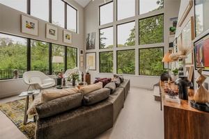Nestled on a picturesque full acre lot facing the serene Mashomek Preserve, this stunning 3 bedroom, 4.