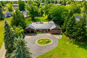 A rare offering along a serene stretch of the Rideau River just moments from the heart of Manotick, this exceptional 3 bedroom, 2.