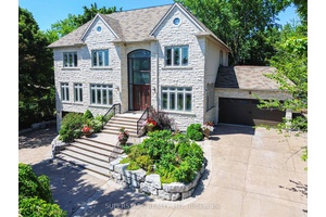 Rarely Found Custom built 3 Car Garage Detached Home Located On A Large Lot With 109 X 190.