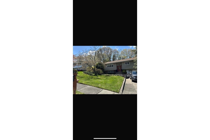 View of front of home with a front lawn