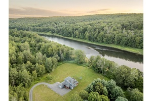 The Overlook on Arrowhead a serene contemporary retreat perched above the Delaware River, where modern sophistication meets Catskills tranquility.